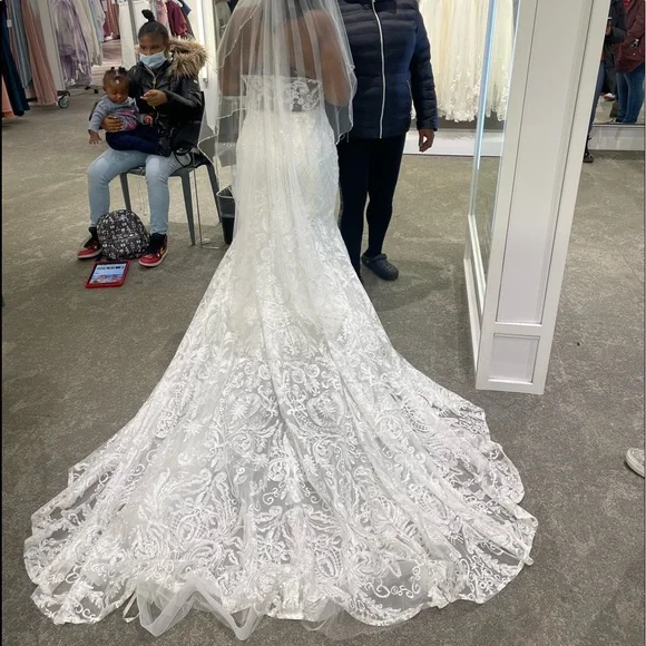 Brand New, Never Worn/Altered Size 16 Ivory David’s Bridal Wedding Dress.